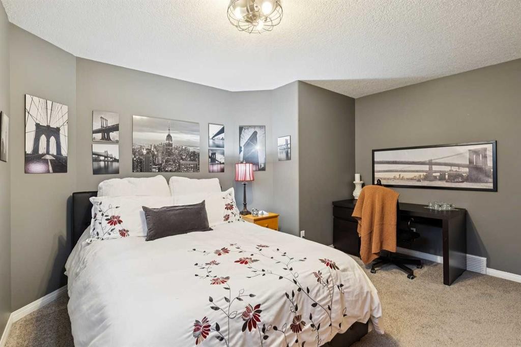 129 Mt Douglas Circle Se, Calgary, AB - Indoor Photo Showing Bedroom