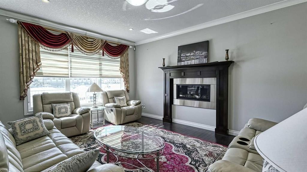 47 Saddlelake Way Ne, Calgary, AB - Indoor Photo Showing Living Room With Fireplace