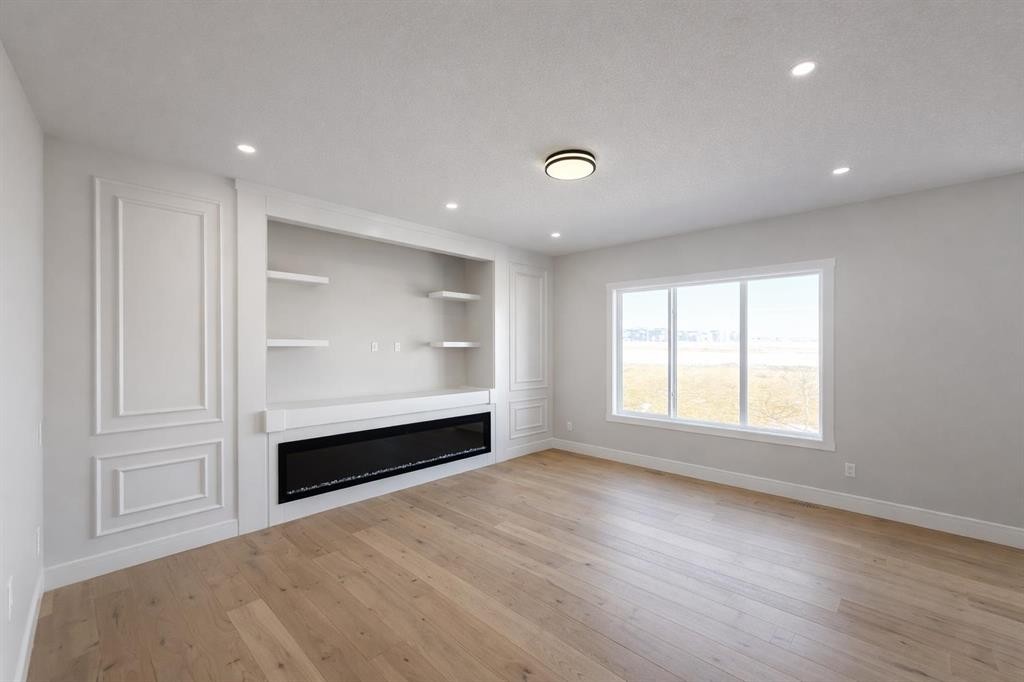 852 Dawson Point, Chestermere, AB - Indoor With Fireplace