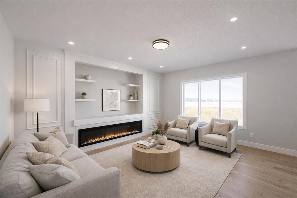 852 Dawson Point, Chestermere, AB - Indoor Photo Showing Living Room With Fireplace