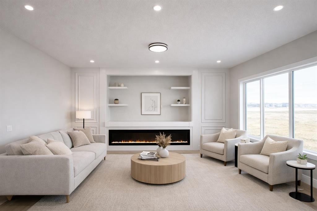 852 Dawson Point, Chestermere, AB - Indoor Photo Showing Living Room With Fireplace
