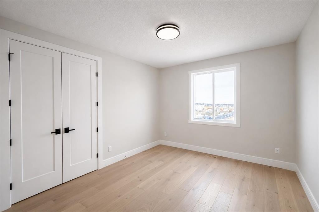 852 Dawson Point, Chestermere, AB - Indoor Photo Showing Other Room