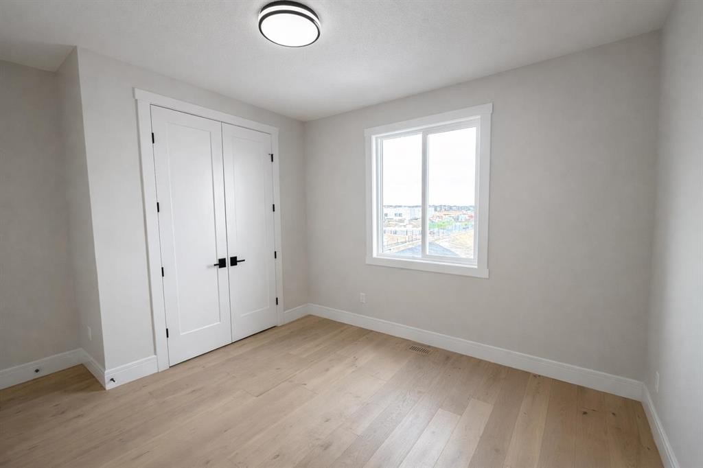 852 Dawson Point, Chestermere, AB - Indoor Photo Showing Other Room