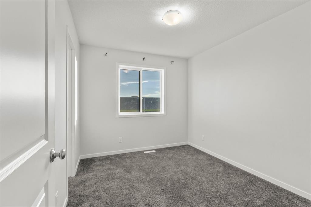 98 Cornerstone Link Ne, Calgary, AB - Indoor Photo Showing Other Room