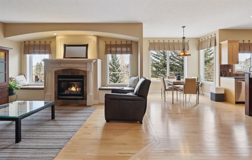 212 Springmere Place, Chestermere, AB - Indoor Photo Showing Living Room With Fireplace