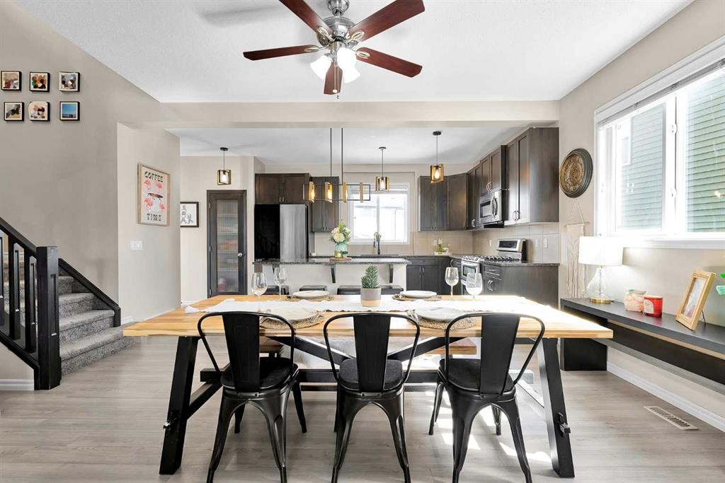 151 Heritage Drive, Cochrane, AB - Indoor Photo Showing Dining Room