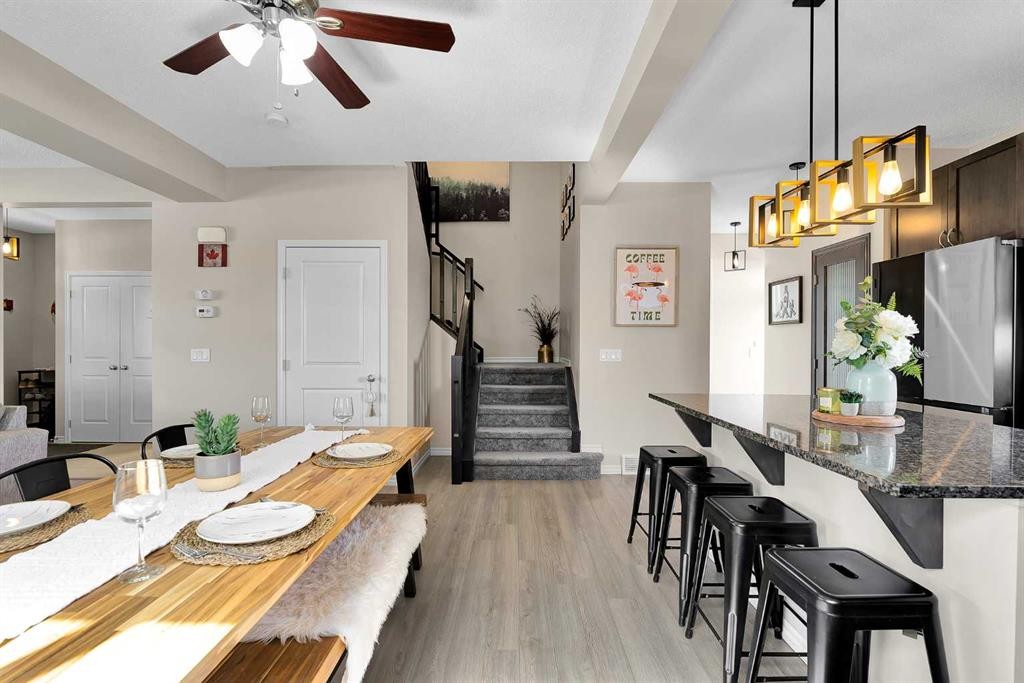151 Heritage Drive, Cochrane, AB - Indoor Photo Showing Dining Room