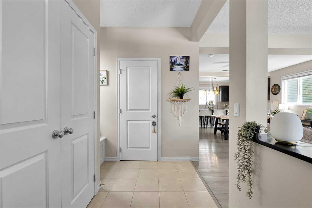 151 Heritage Drive, Cochrane, AB - Indoor Photo Showing Other Room