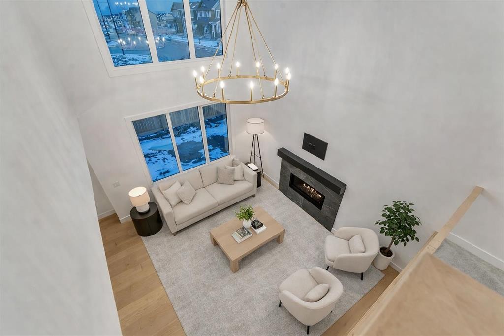 153 Waterford Passage, Chestermere, AB - Indoor With Fireplace