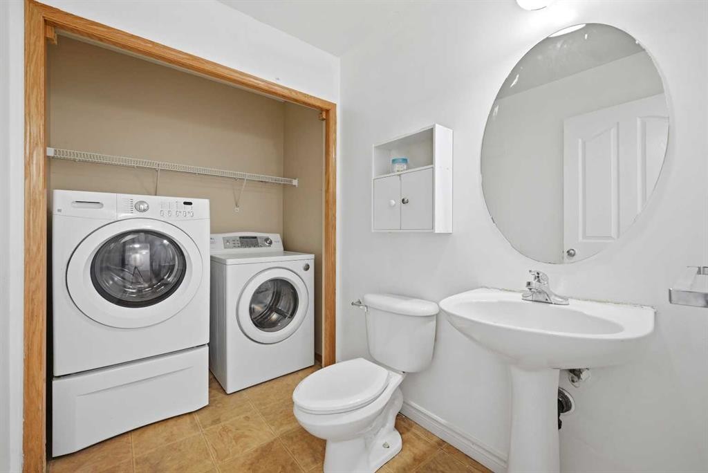 165 Saddlecrest Way Ne, Calgary, AB - Indoor Photo Showing Laundry Room