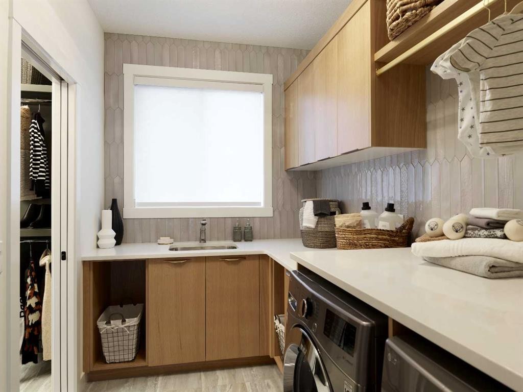 42 Setonridge Way Se, Calgary, AB - Indoor Photo Showing Laundry Room