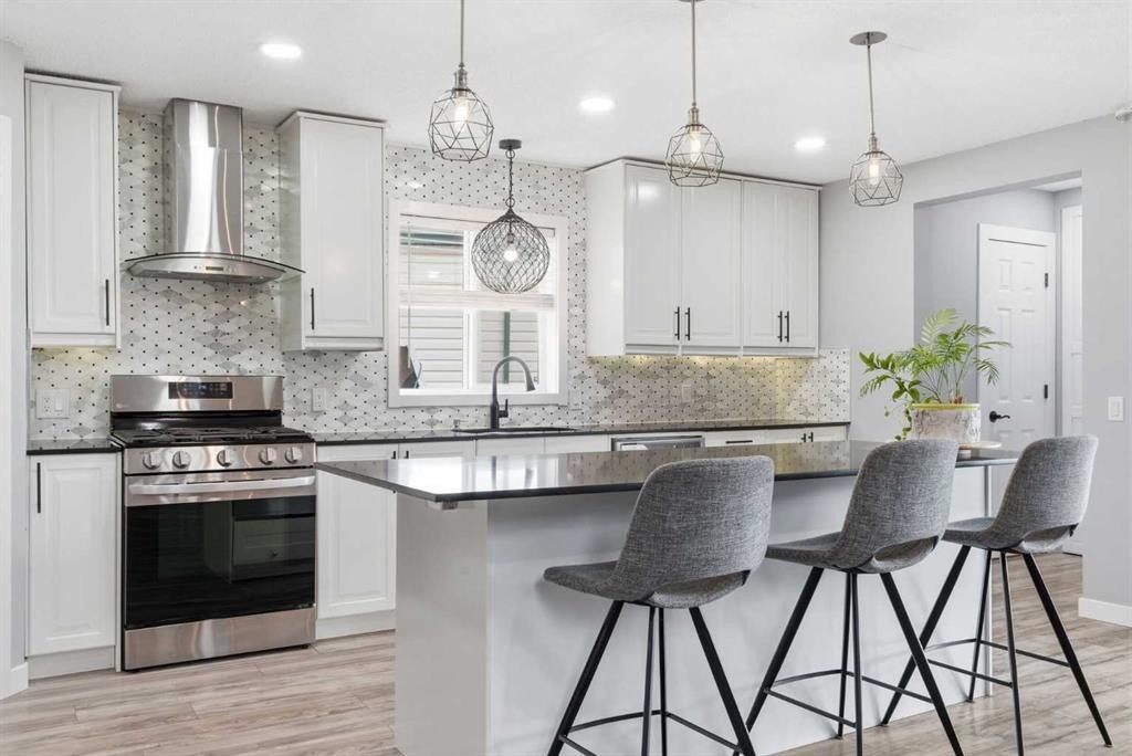 23 Prestwick Green Se, Calgary, AB - Indoor Photo Showing Kitchen With Upgraded Kitchen