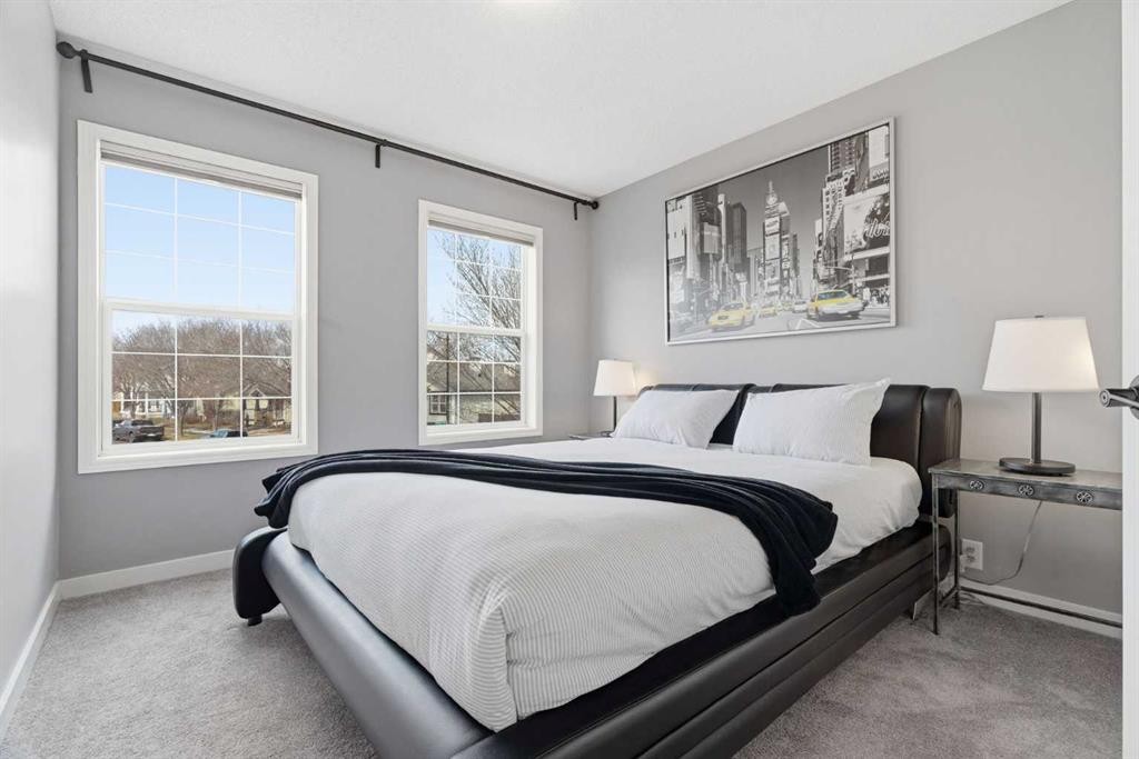 23 Prestwick Green Se, Calgary, AB - Indoor Photo Showing Bedroom