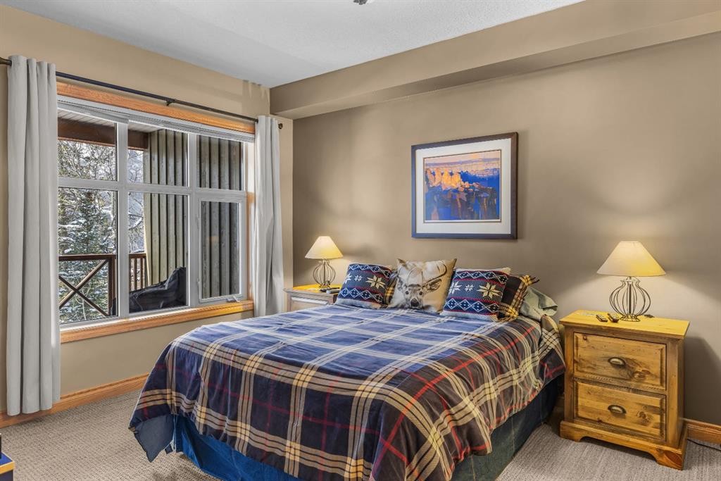 202-3 Aspen Glen, Canmore, AB - Indoor Photo Showing Bedroom