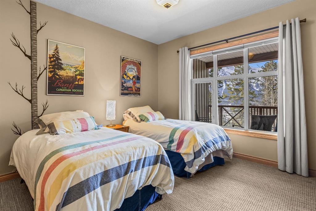 202-3 Aspen Glen, Canmore, AB - Indoor Photo Showing Bedroom