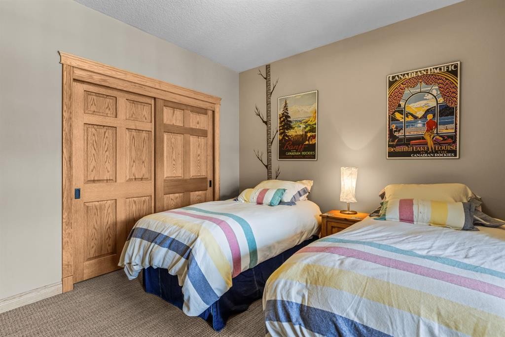 202-3 Aspen Glen, Canmore, AB - Indoor Photo Showing Bedroom