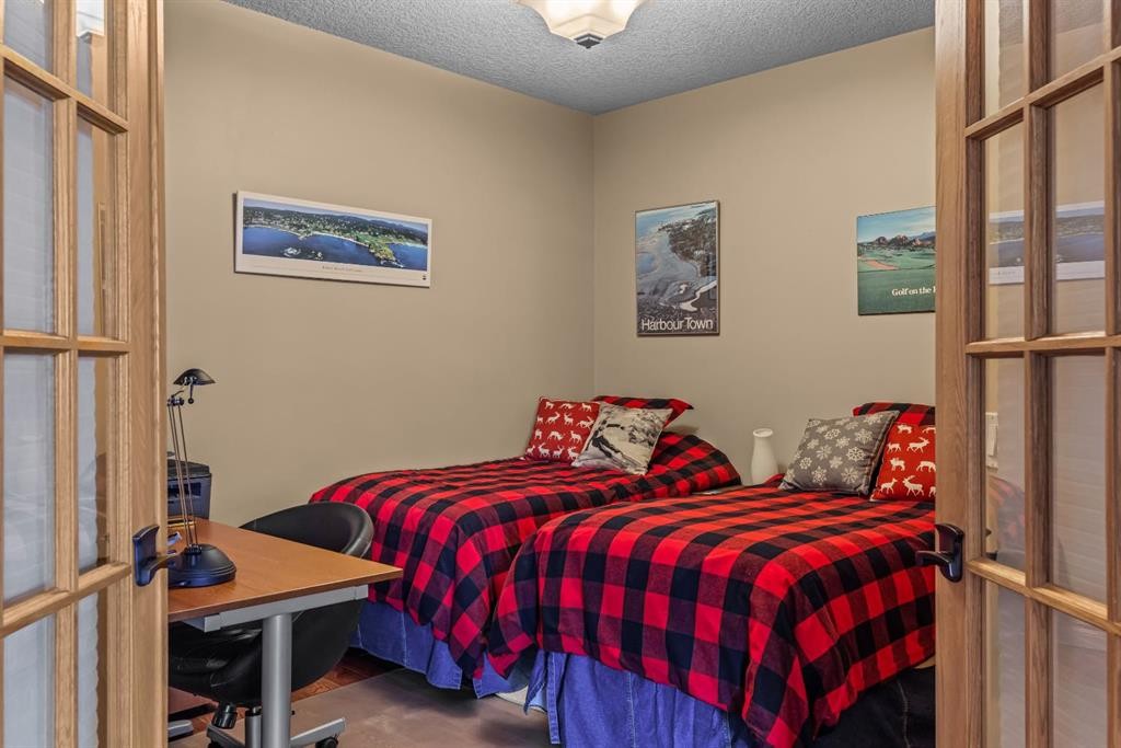 202-3 Aspen Glen, Canmore, AB - Indoor Photo Showing Bedroom