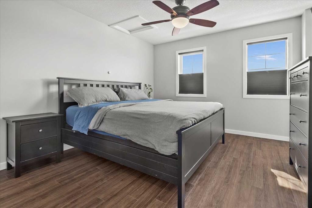 399 Copperpond Boulevard Se, Calgary, AB - Indoor Photo Showing Bedroom