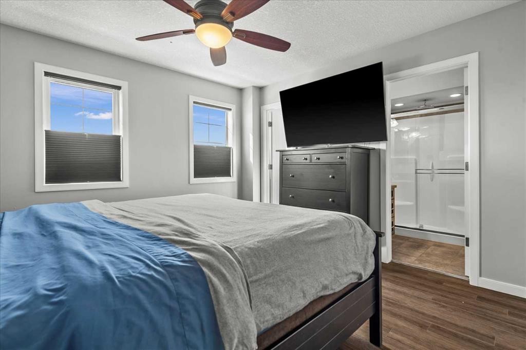 399 Copperpond Boulevard Se, Calgary, AB - Indoor Photo Showing Bedroom