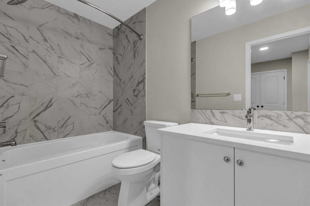 249 Aquila Drive Nw, Calgary, AB - Indoor Photo Showing Bathroom
