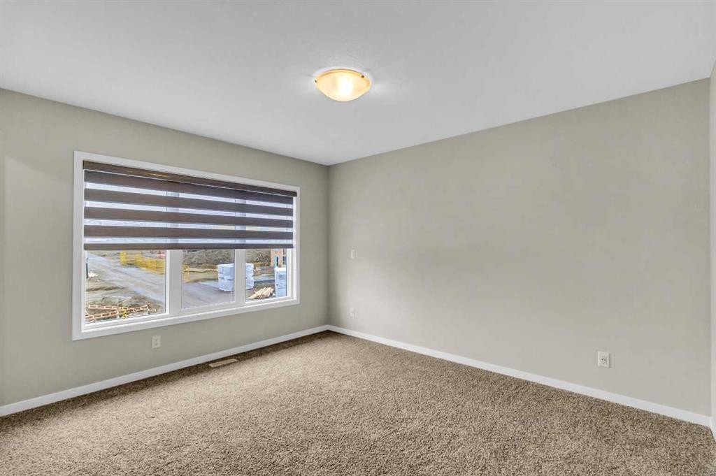 249 Aquila Drive Nw, Calgary, AB - Indoor Photo Showing Other Room