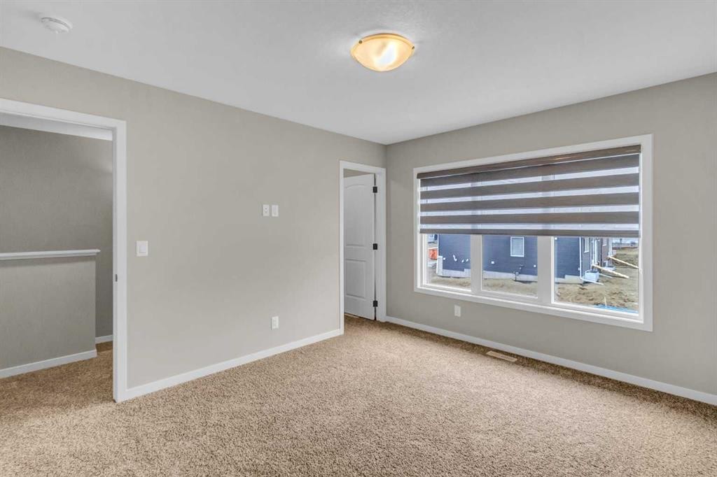 249 Aquila Drive Nw, Calgary, AB - Indoor Photo Showing Other Room