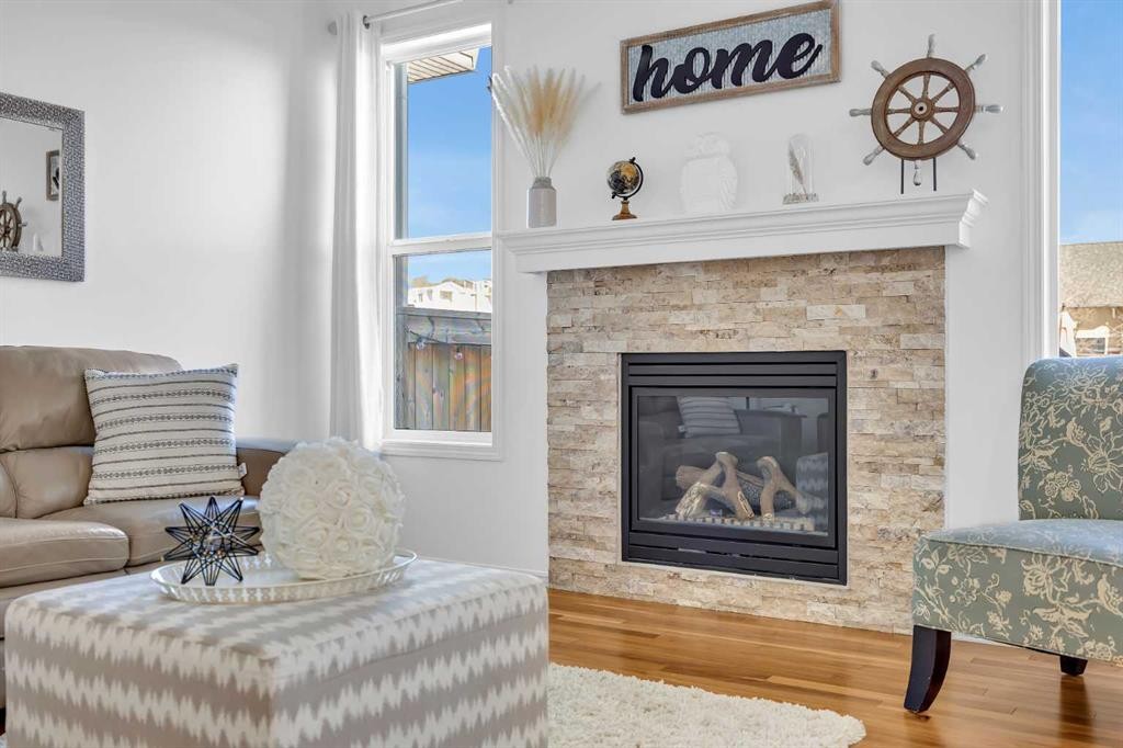 30 Cranarch View Se, Calgary, AB - Indoor Photo Showing Living Room With Fireplace
