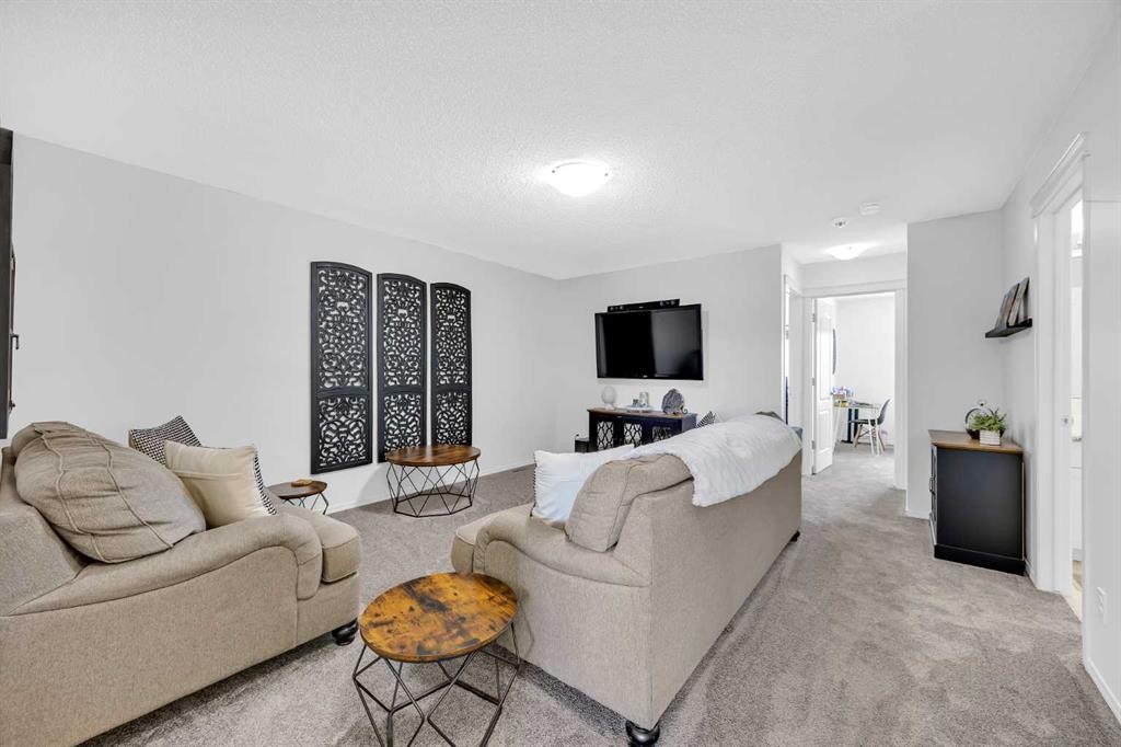 30 Cranarch View Se, Calgary, AB - Indoor Photo Showing Living Room