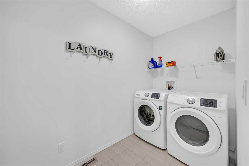 30 Cranarch View Se, Calgary, AB - Indoor Photo Showing Laundry Room