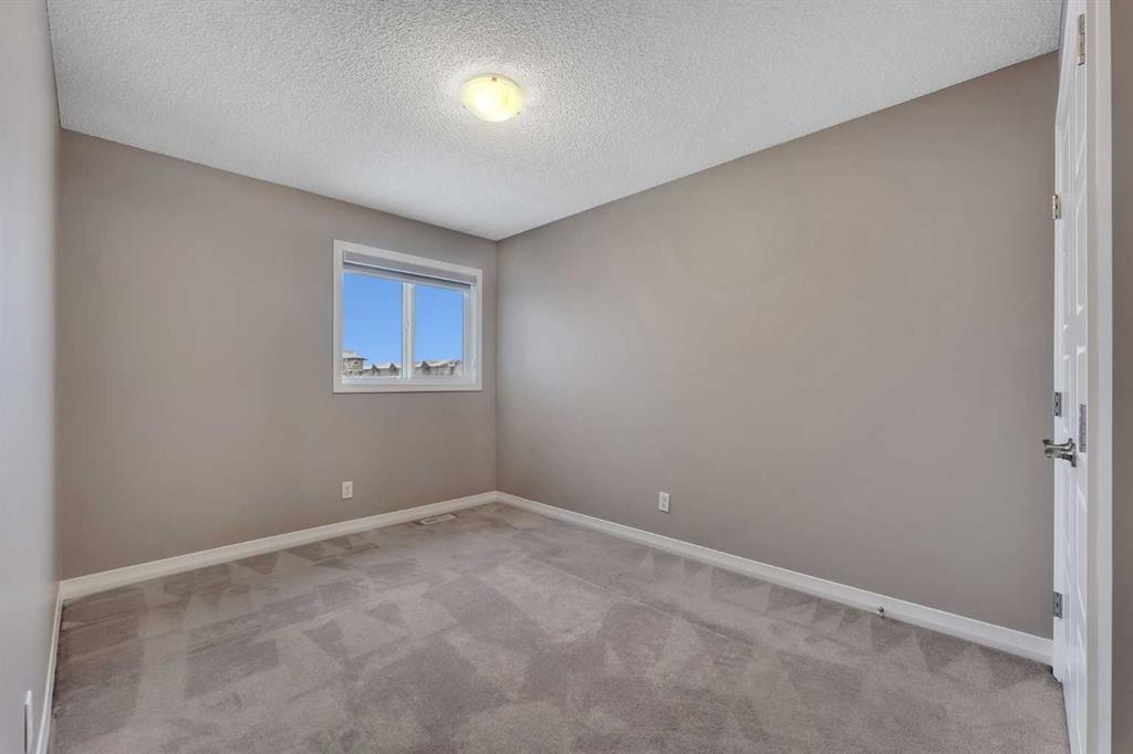 96 Cornerstone Passage Ne, Calgary, AB - Indoor Photo Showing Other Room