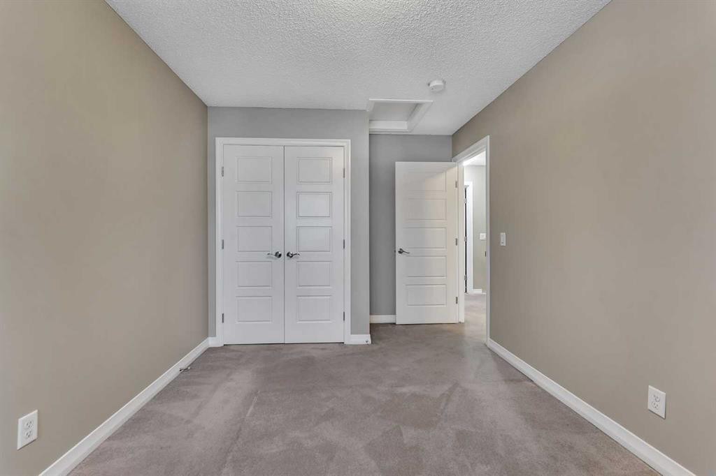96 Cornerstone Passage Ne, Calgary, AB - Indoor Photo Showing Other Room