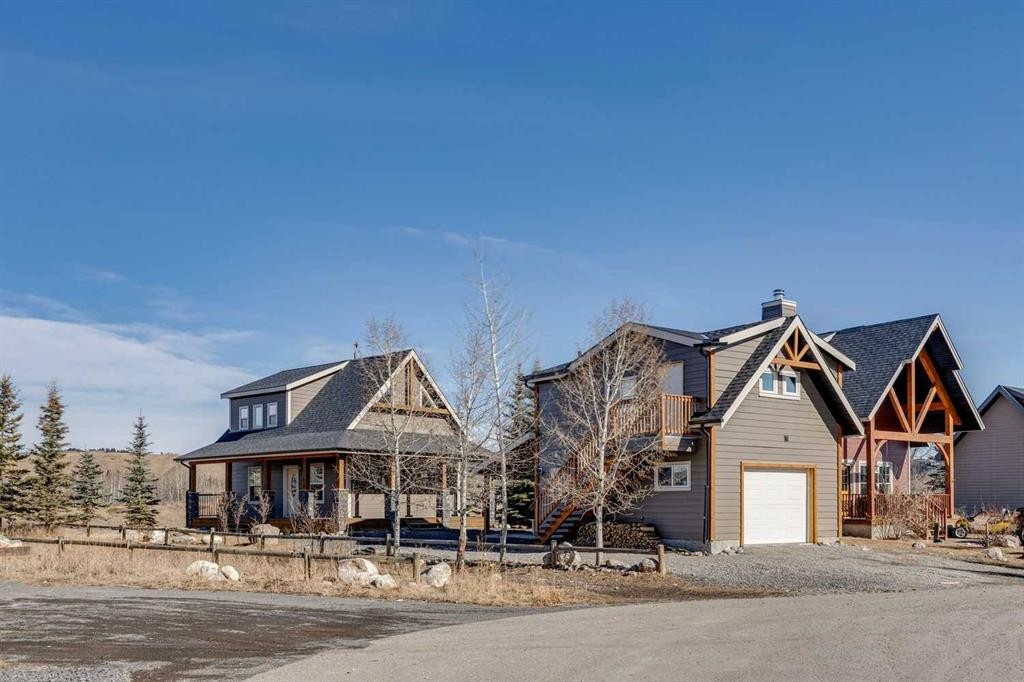 240 Cottageclub Crescent, Rural Rocky View County, AB - Outdoor With Facade