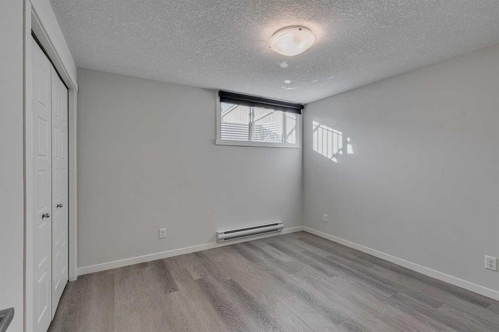 504-474 Seton Circle Se, Calgary, AB - Indoor Photo Showing Other Room