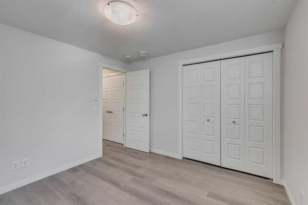 504-474 Seton Circle Se, Calgary, AB - Indoor Photo Showing Other Room