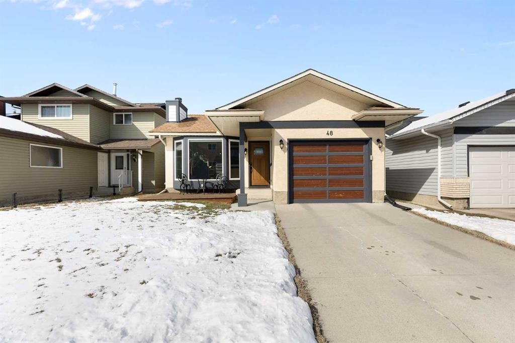 48 Cedargrove Road Sw, Calgary, AB - Outdoor With Facade