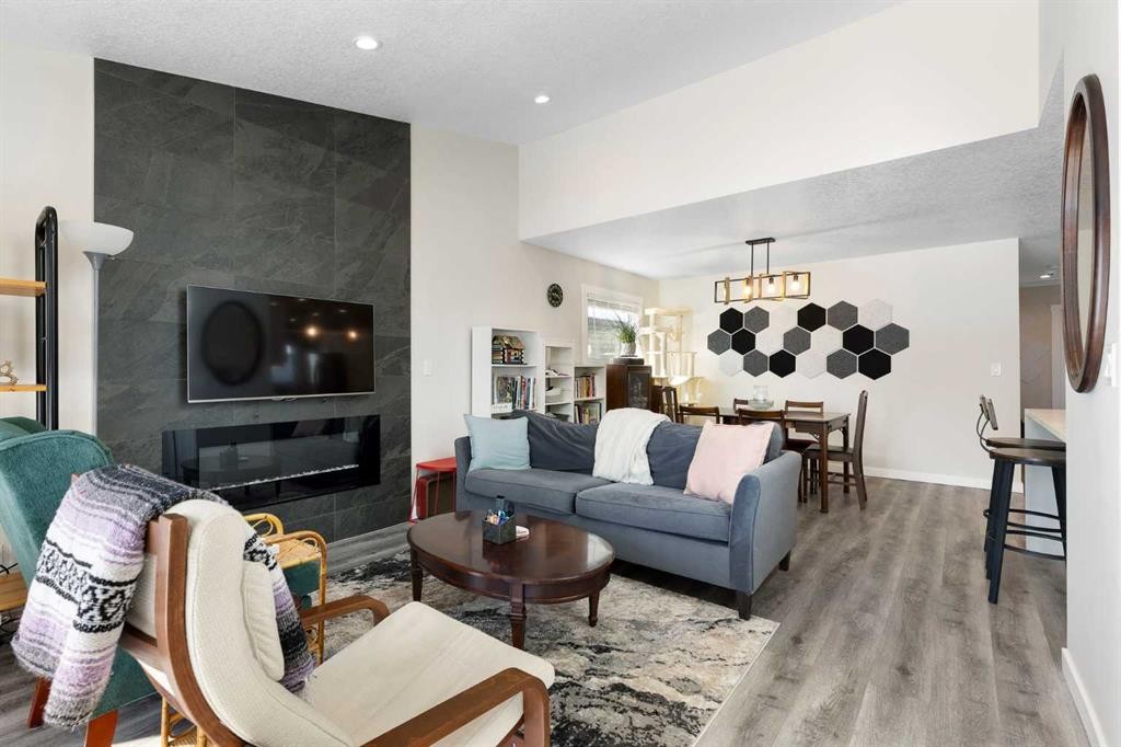 48 Cedargrove Road Sw, Calgary, AB - Indoor Photo Showing Living Room With Fireplace