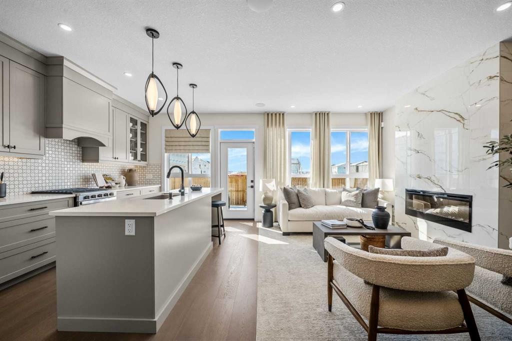 203 Huxland Path Ne, Calgary, AB - Indoor With Fireplace
