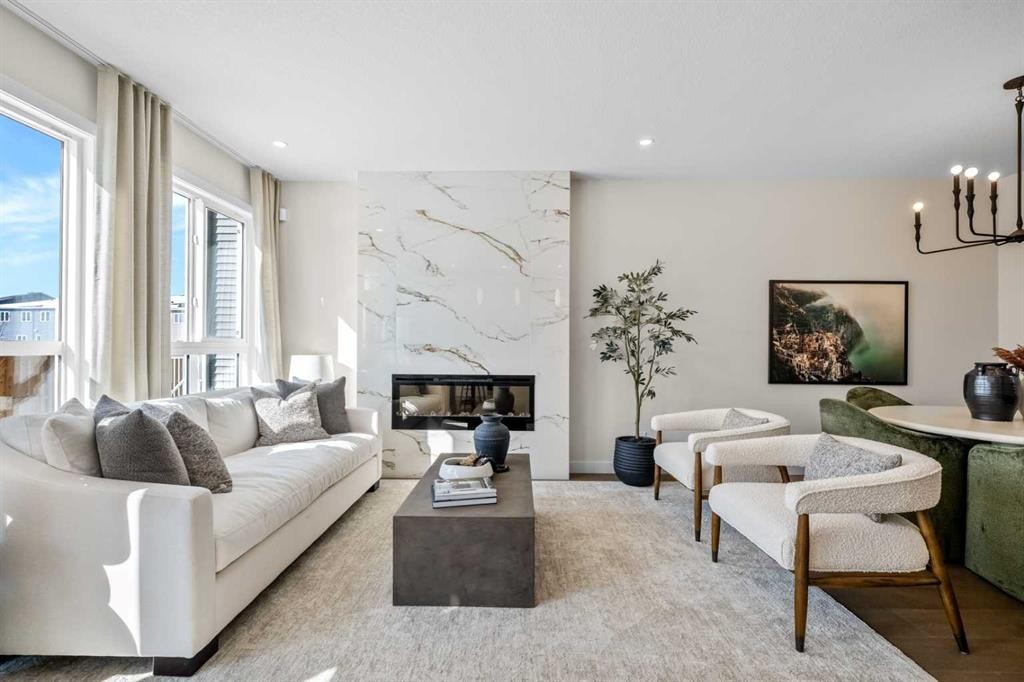 203 Huxland Path Ne, Calgary, AB - Indoor Photo Showing Living Room With Fireplace