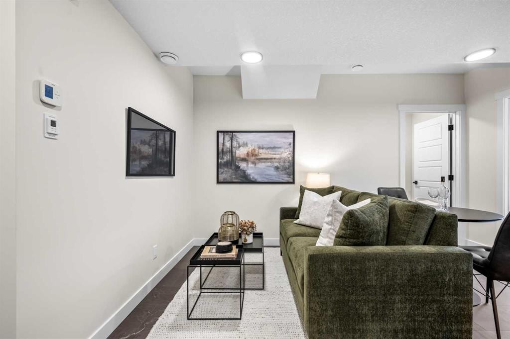 203 Huxland Path Ne, Calgary, AB - Indoor Photo Showing Living Room