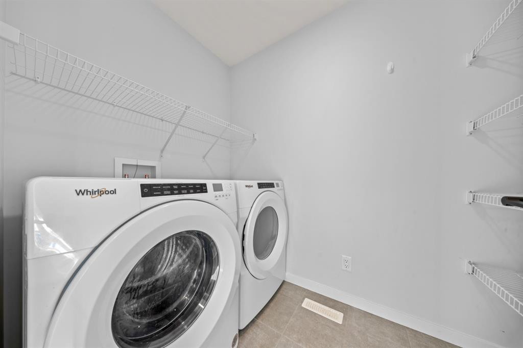 153 Edith Way Nw, Calgary, AB - Indoor Photo Showing Laundry Room