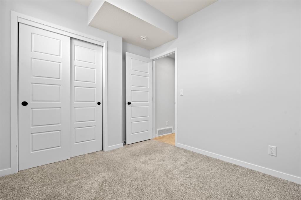 153 Edith Way Nw, Calgary, AB - Indoor Photo Showing Other Room