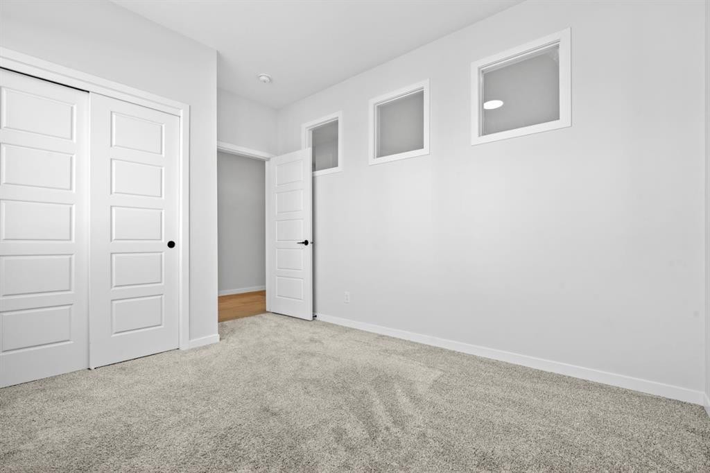 153 Edith Way Nw, Calgary, AB - Indoor Photo Showing Other Room