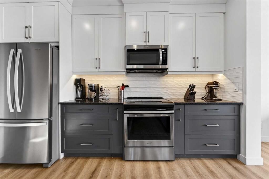 83 Seton Heath Se, Calgary, AB - Indoor Photo Showing Kitchen With Upgraded Kitchen