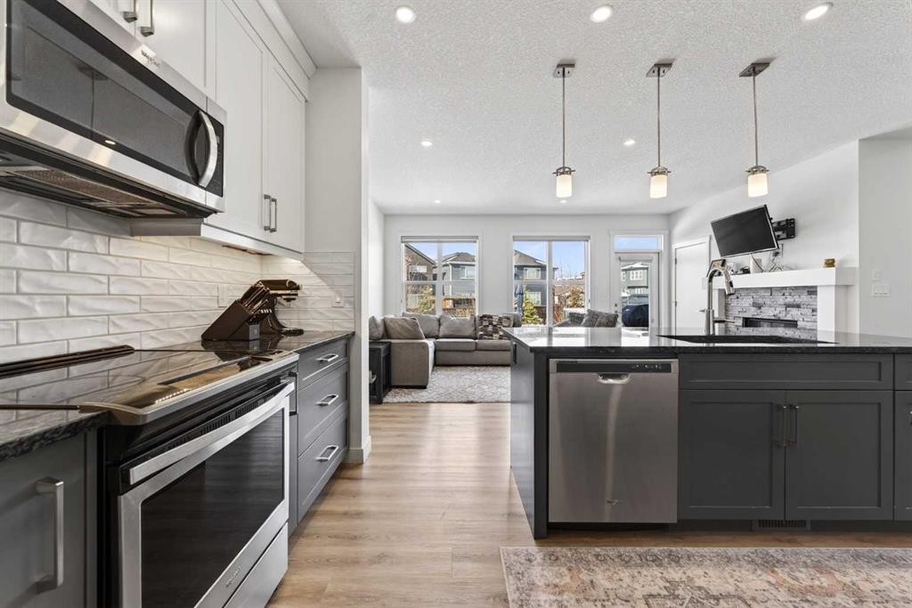 83 Seton Heath Se, Calgary, AB - Indoor Photo Showing Kitchen With Upgraded Kitchen