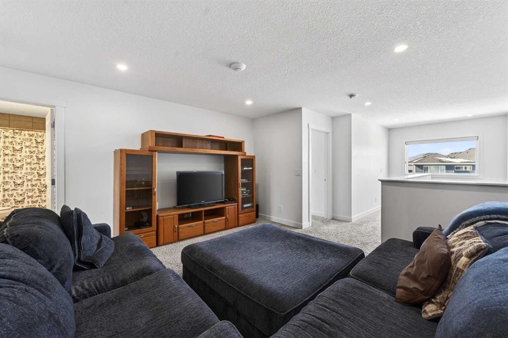83 Seton Heath Se, Calgary, AB - Indoor Photo Showing Living Room