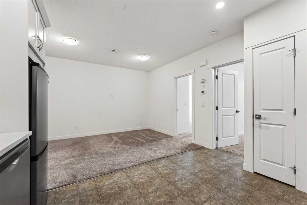 83 Seton Heath Se, Calgary, AB - Indoor Photo Showing Other Room