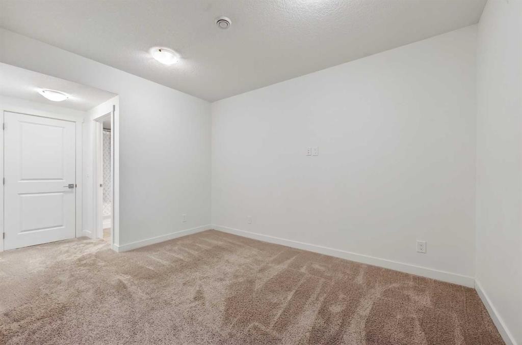 83 Seton Heath Se, Calgary, AB - Indoor Photo Showing Other Room