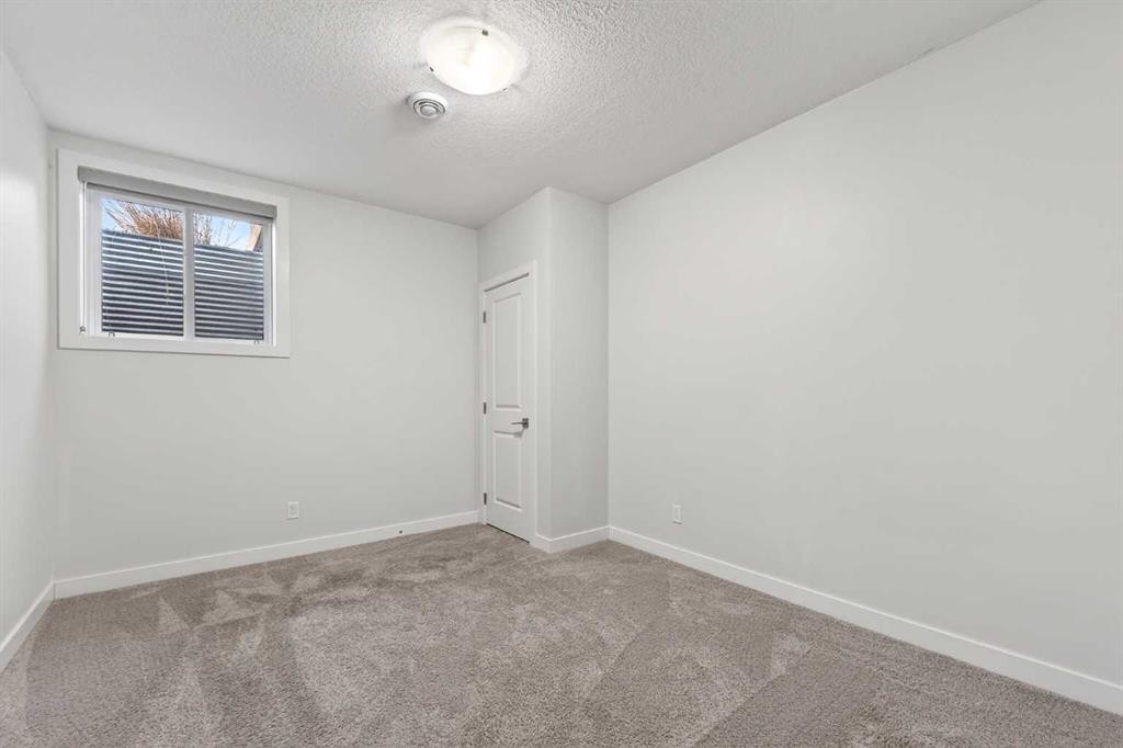 83 Seton Heath Se, Calgary, AB - Indoor Photo Showing Other Room