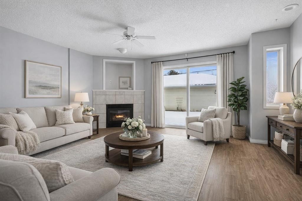 3101 39 Street Sw, Calgary, AB - Indoor Photo Showing Living Room With Fireplace