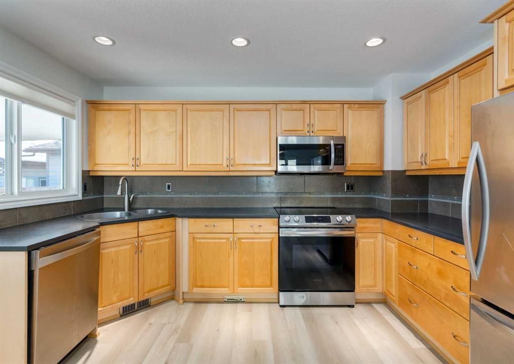 367 Acadia Drive Se, Calgary, AB - Indoor Photo Showing Kitchen With Stainless Steel Kitchen With Double Sink